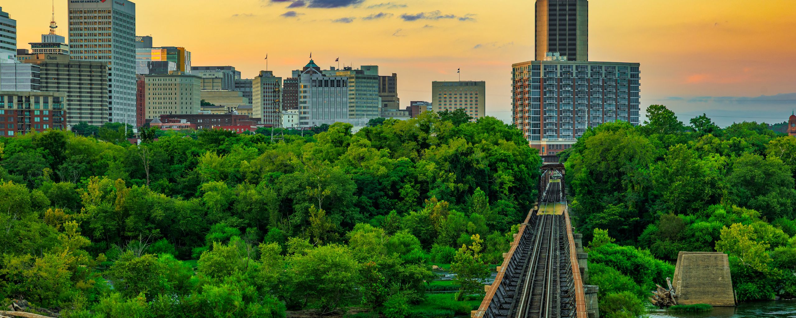 2560x1024 Wallpaper bridge, railway, river, city, sunset, landscape