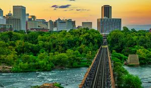 Preview wallpaper bridge, railway, river, city, sunset, landscape