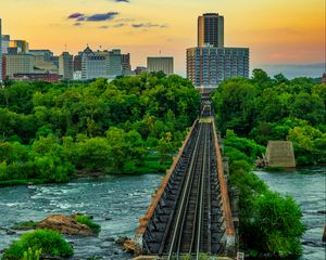 Preview wallpaper bridge, railway, river, city, sunset, landscape
