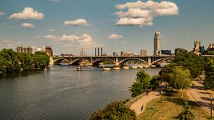 Preview wallpaper bridge, river, buildings, trees, clouds, sky