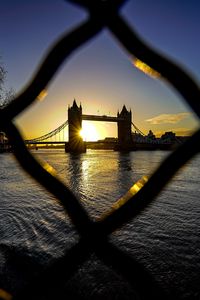 Preview wallpaper bridge, river, buildings, city, sunrise