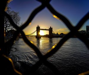 Preview wallpaper bridge, river, buildings, city, sunrise