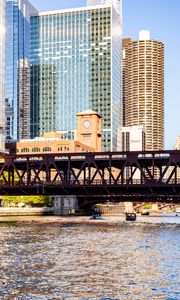 Preview wallpaper bridge, river, buildings, skyscrapers, yacht, city