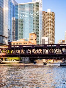 Preview wallpaper bridge, river, buildings, skyscrapers, yacht, city