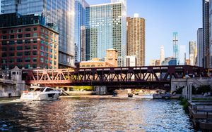 Preview wallpaper bridge, river, buildings, skyscrapers, yacht, city