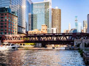 Preview wallpaper bridge, river, buildings, skyscrapers, yacht, city