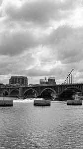 Preview wallpaper bridge, river, clouds, buildings, black and white