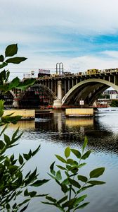 Preview wallpaper bridge, river, leaves, branches