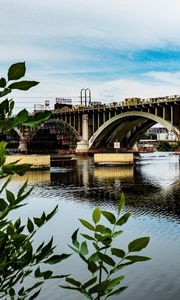 Preview wallpaper bridge, river, leaves, branches