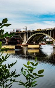 Preview wallpaper bridge, river, leaves, branches