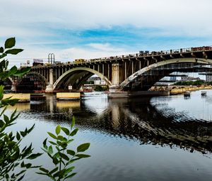 Preview wallpaper bridge, river, leaves, branches