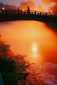 Preview wallpaper bridge, river, light, sunset, dark