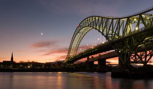 Preview wallpaper bridge, river, pilings, architecture, evening