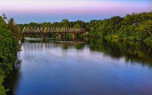 Preview wallpaper bridge, river, smooth surface, clouds, sky, colors, trees, design, lilac