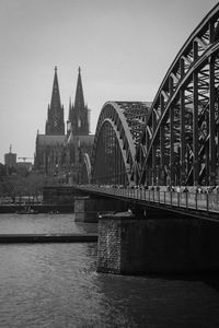 Preview wallpaper bridge, river, towers, buildings, black and white
