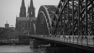 Preview wallpaper bridge, river, towers, buildings, black and white