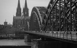 Preview wallpaper bridge, river, towers, buildings, black and white