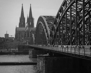 Preview wallpaper bridge, river, towers, buildings, black and white