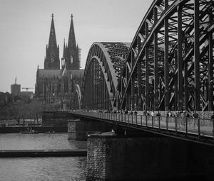 Preview wallpaper bridge, river, towers, buildings, black and white