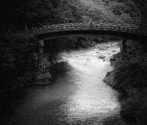 Preview wallpaper bridge, river, trees, stones, black and white