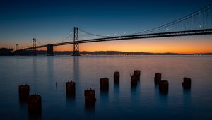 Preview wallpaper bridge, river, twilight, evening, water, pillars