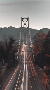 Preview wallpaper bridge, road, aerial view, mountains, long exposure