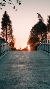 Preview wallpaper bridge, road, asphalt, sunset, dusk