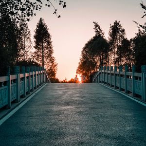 Preview wallpaper bridge, road, asphalt, sunset, dusk