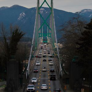 Preview wallpaper bridge, road, cars, mountains, trees