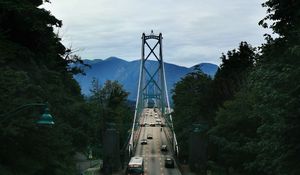 Preview wallpaper bridge, road, cars, trees, mountains, distance