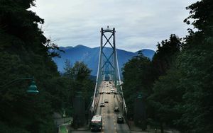 Preview wallpaper bridge, road, cars, trees, mountains, distance