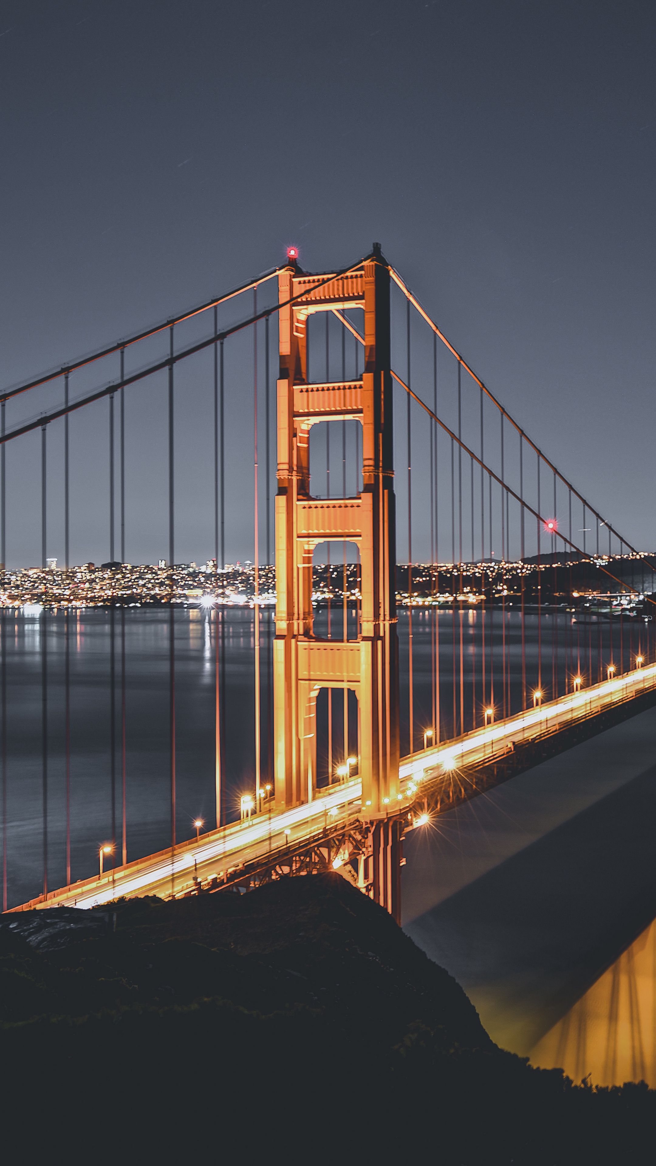 Download wallpaper 2160x3840 bridge, road, lights, sea, city, night ...