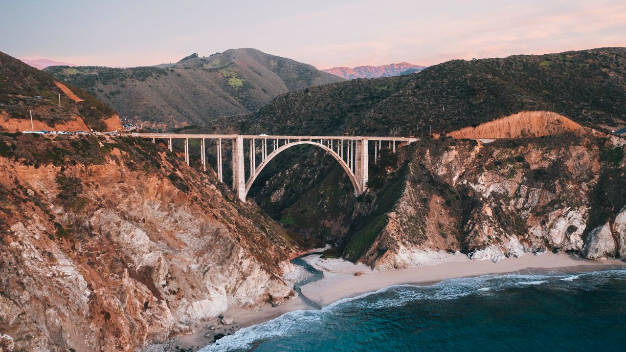 Wallpaper bridge, rocks, peaks, sea