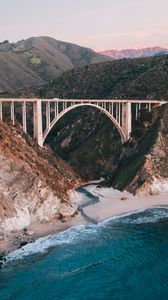 Preview wallpaper bridge, rocks, peaks, sea