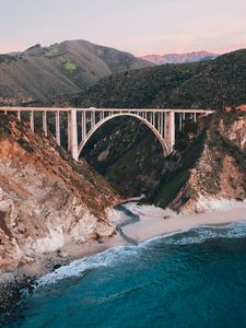 Preview wallpaper bridge, rocks, peaks, sea