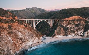 Preview wallpaper bridge, rocks, peaks, sea