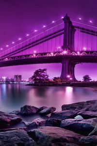 Preview wallpaper bridge, rocks, river, city, city on the water, reflection