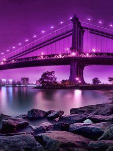 Preview wallpaper bridge, rocks, river, city, city on the water, reflection