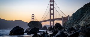 Preview wallpaper bridge, rocks, shore, beach, ocean