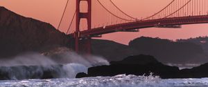 Preview wallpaper bridge, rocks, waves, spray, shore