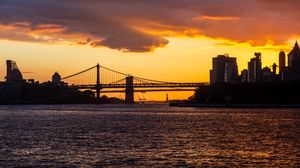 Preview wallpaper bridge, sea, buildings, silhouettes, twilight