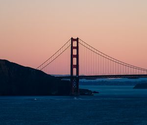 Preview wallpaper bridge, sea, hill, silhouettes, evening