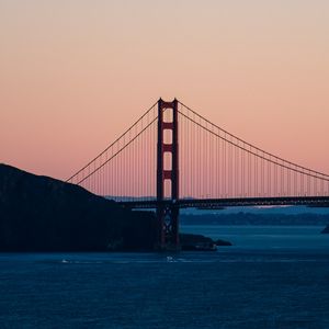 Preview wallpaper bridge, sea, hill, silhouettes, evening