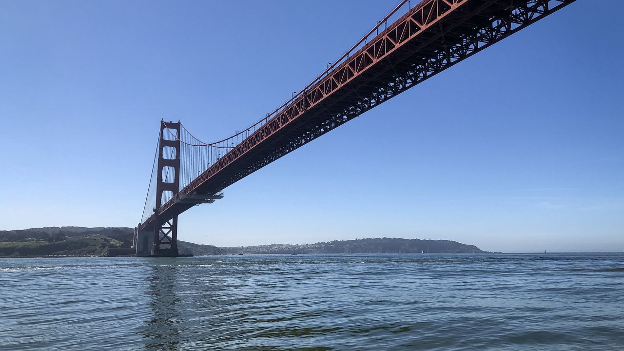 Wallpaper bridge, sea, hills, sky