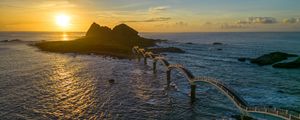 Preview wallpaper bridge, sea, mountains, silhouette, nature, sunset