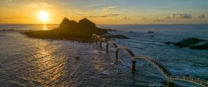 Preview wallpaper bridge, sea, mountains, silhouette, nature, sunset