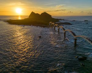 Preview wallpaper bridge, sea, mountains, silhouette, nature, sunset