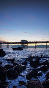 Preview wallpaper bridge, sea, rocks, twilight