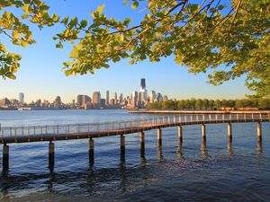 Preview wallpaper bridge, sea, shore, river, buildings, trees