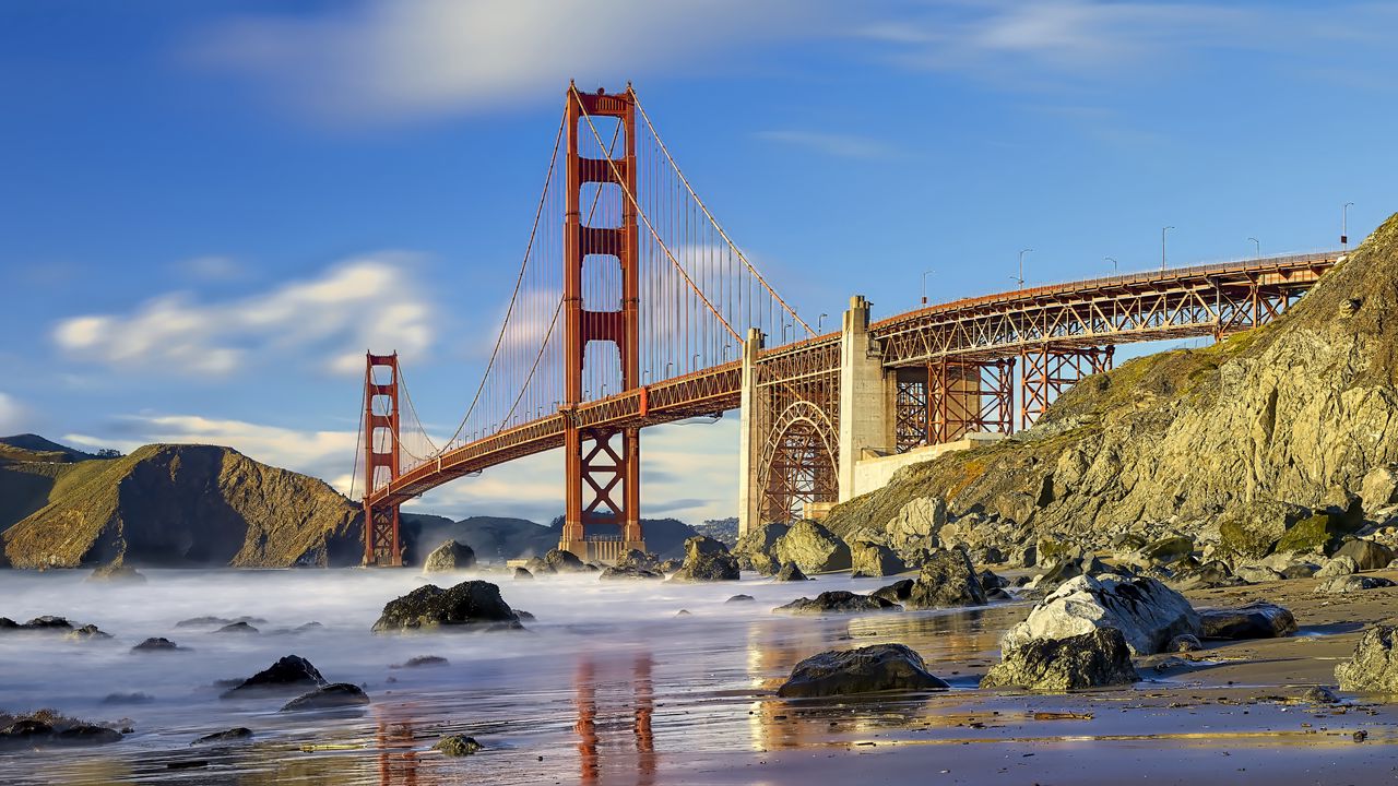 Wallpaper bridge, sea, stones, sky